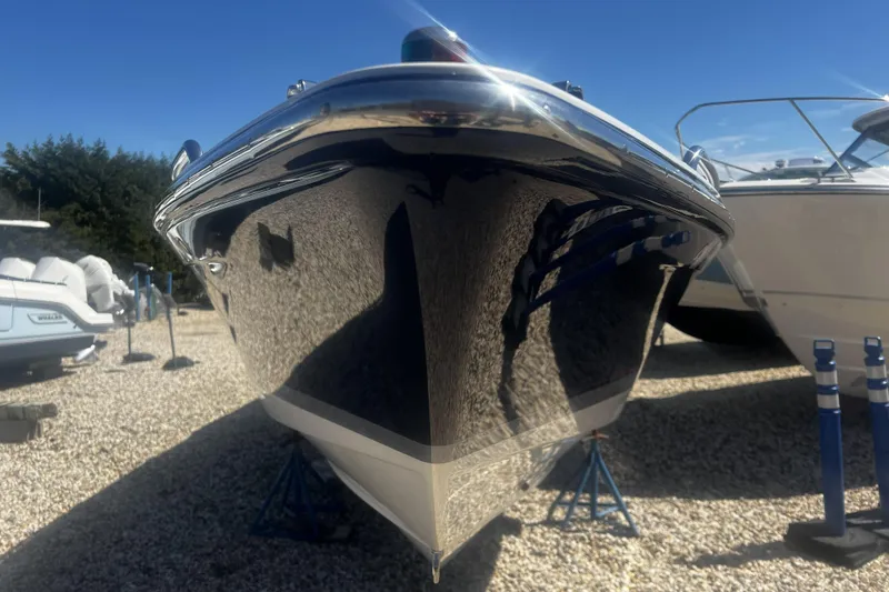 Slide: The Image of 2017 Formula 292 FASTech boat dashboard with steering wheel and control panel. - 14