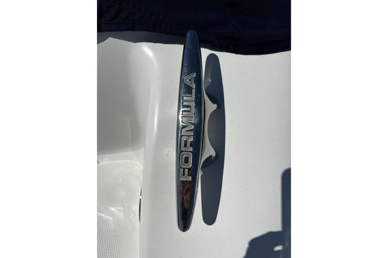 Slide: The Image of 2017 Formula 292 FASTech boat on gravel lot under clear sky. - 3