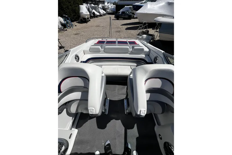 Slide: The Image of 2017 Formula 292 FASTech boat on gravel lot under clear blue sky. - 4