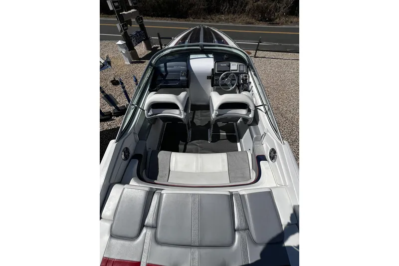 Slide: The Image of 2017 Formula 292 FASTech boat interior with cushioned seating and speaker system. - 5
