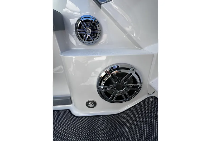 Slide: The Image of 2017 Formula 292 FASTech boat interior with sleek white seating and modern dashboard. - 8