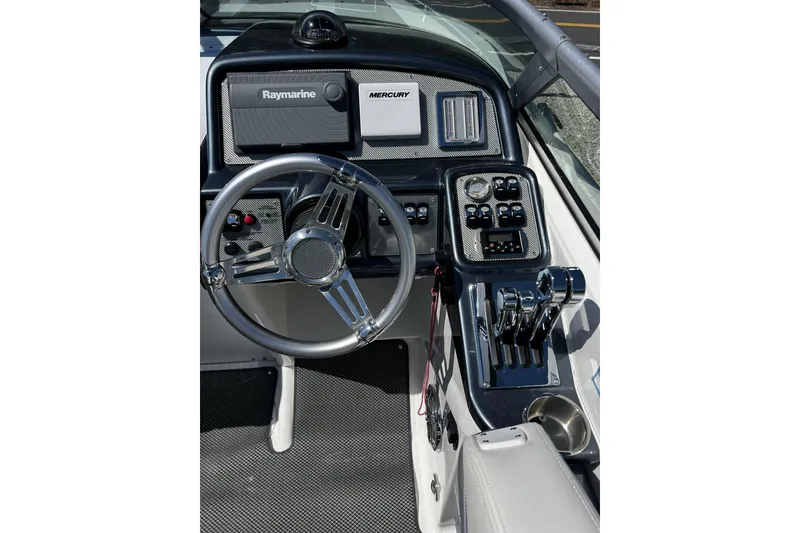 Slide: The Image of 2017 Formula 292 FASTech boat interior with dual seats and sleek dashboard design. - 9