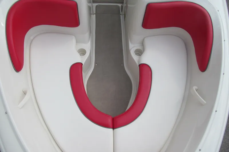 Slide: The Image of Red and white seating area on a 2006 Sea Ray 205 Sport boat. - 10