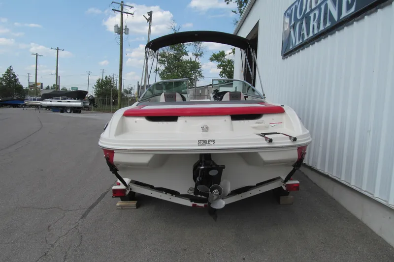 Slide: The Image of 2006 Sea Ray 205 Sport boat parked at Stokley's Marine dealership. - 4