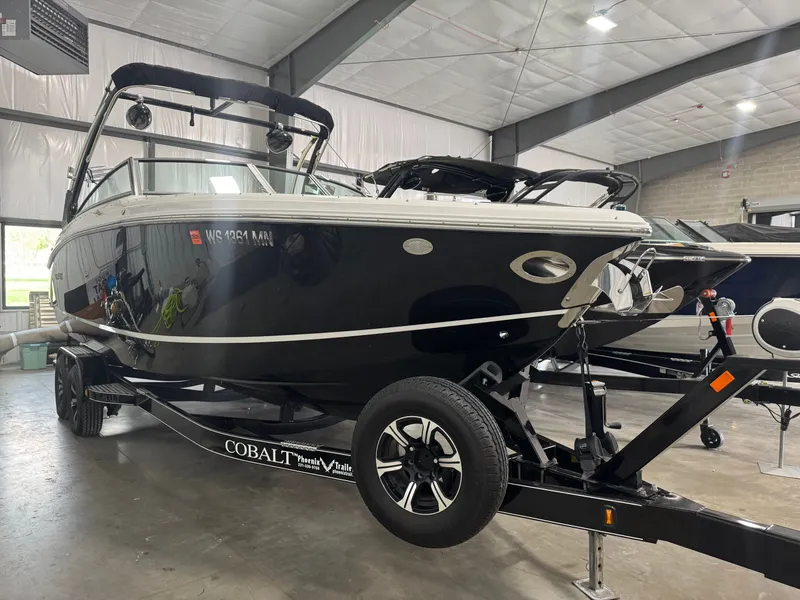 Slide: The Image of 2016 Cobalt R7 boat on trailer in warehouse. - 2