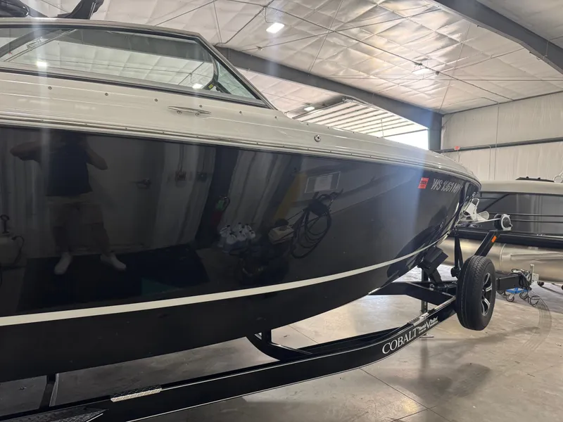 Slide: The Image of 2016 Cobalt R7 boat in a warehouse on a trailer. - 3