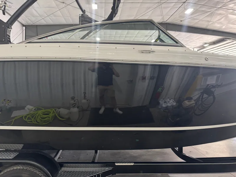 Slide: The Image of 2016 Cobalt R7 boat in a warehouse, side view. - 4