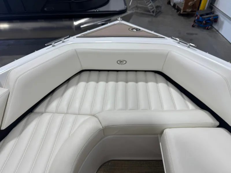Slide: The Image of Interior of a 2016 Cobalt R7 boat with white leather seating. - 41