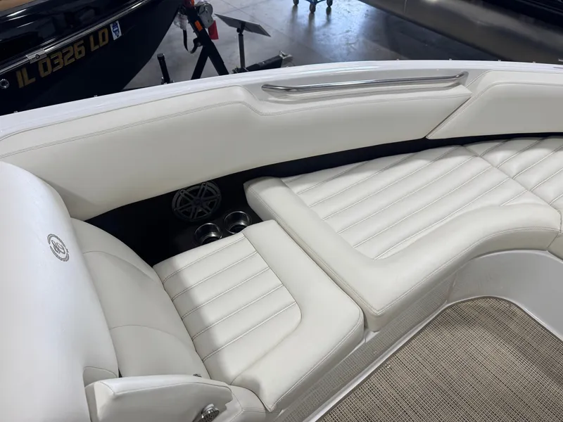 Slide: The Image of Interior of a 2016 Cobalt R7 boat with white leather seating. - 43