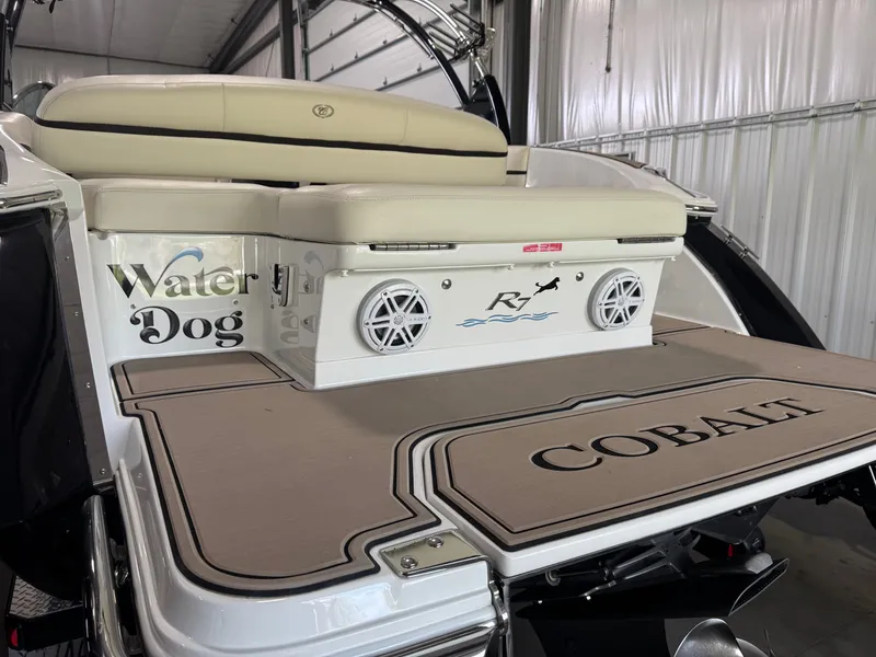 Slide: The Image of 2016 Cobalt R7 boat with "Water Dog" lettering. - 8