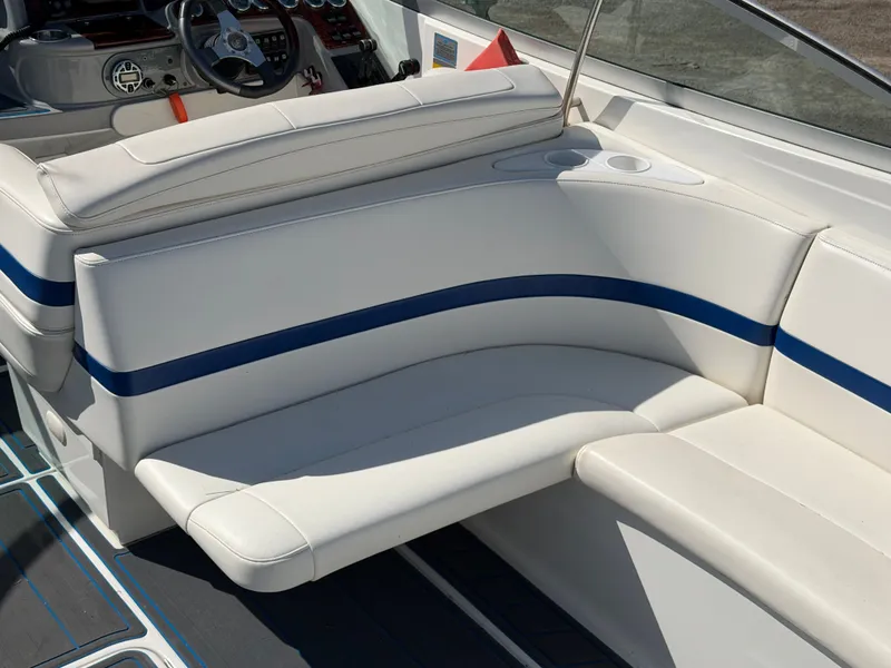 Slide: The Image of Interior of a 2002 Formula 330 Sun Sport boat with white seating. - 10