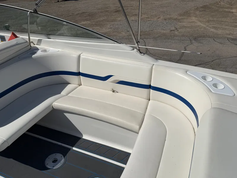 Slide: The Image of Interior of a 2002 Formula 330 Sun Sport boat with white seating. - 11