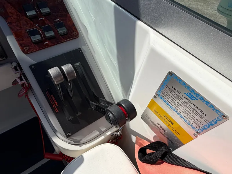 Slide: The Image of Control console of a 2002 Formula 330 Sun Sport boat. - 15