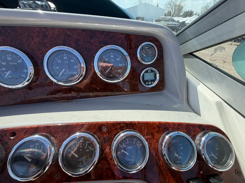 Slide: The Image of Dashboard of a 2002 Formula 330 Sun Sport boat with gauges. - 18