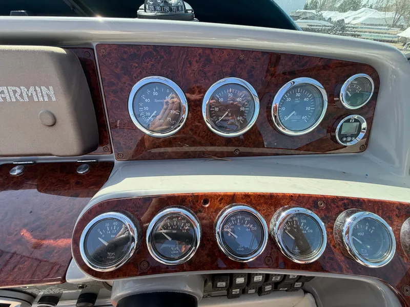 Slide: The Image of Dashboard of a 2002 Formula 330 Sun Sport boat with gauges. - 19