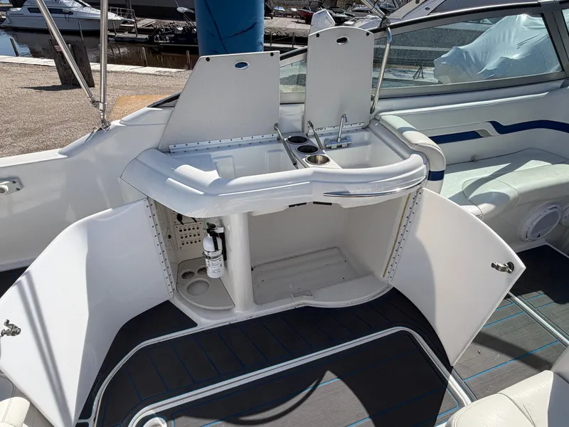 Slide: The Image of 2002 Formula 330 Sun Sport boat kitchenette with sink and storage. - 26