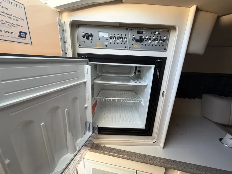 Slide: The Image of Open fridge in 2002 Formula 330 Sun Sport boat. - 41