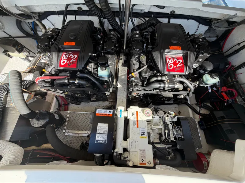 Slide: The Image of Engine compartment of a 2002 Formula 330 Sun Sport boat with dual engines. - 47