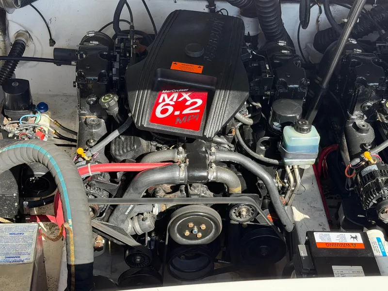 Slide: The Image of Engine compartment of a 2002 Formula 330 Sun Sport boat with MerCruiser MX 6.2 MPI engine. - 49