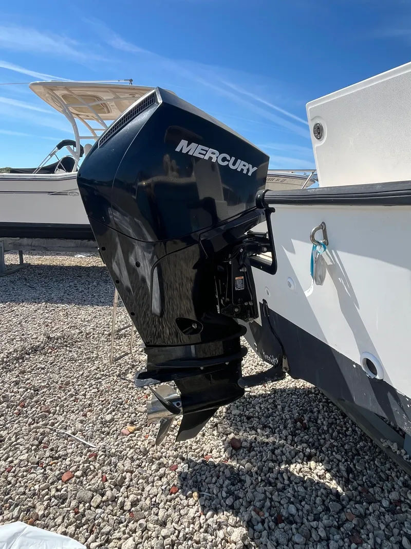 Slide: The Image of Boston Whaler 210 Montauk 2021 with Mercury outboard motor. - 4
