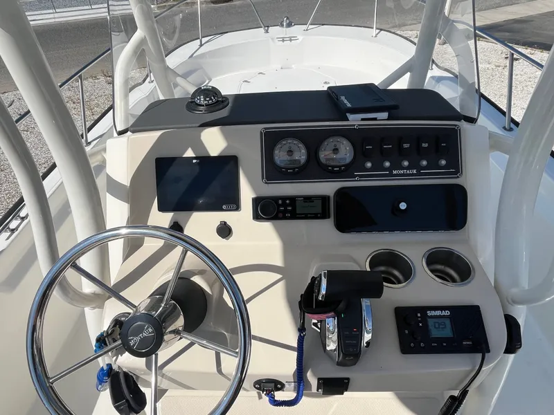 Slide: The Image of Helm console of a 2021 Boston Whaler 210 Montauk boat. - 5