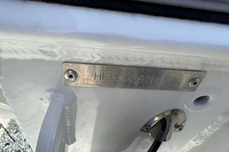 Slide: The Image of 2024 Highfield Sport 360 boat hull identification number plate. - 11