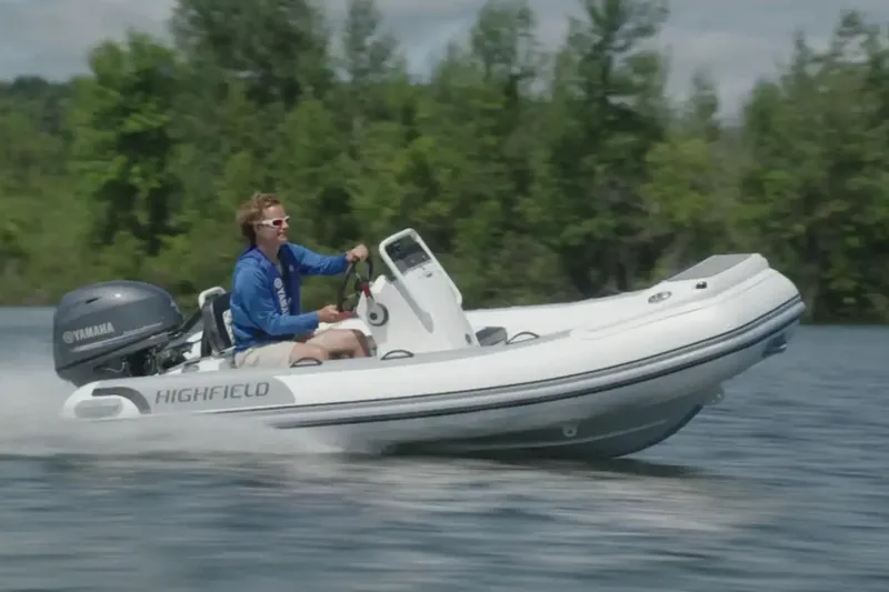 Slide: The Image of Manufacturer Provided Image: 2024 Highfield Sport 360 inflatable boat speeding on a lake. - 21