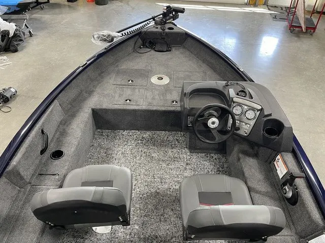 Slide: The Image of Interior view of 2026 Tracker Pro Guide V-16 SC boat. - 16