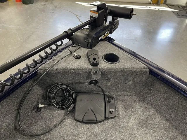 Slide: The Image of 2026 Tracker Pro Guide V-16 SC boat with Minn Kota trolling motor. - 17