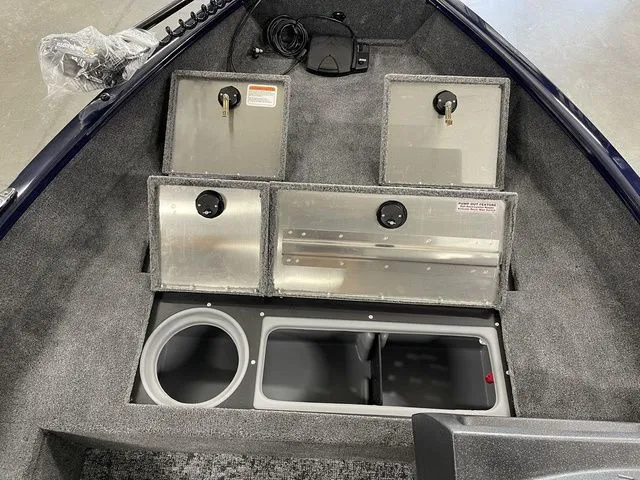 Slide: The Image of Interior view of Tracker Pro Guide V-16 SC 2026 boat. - 19