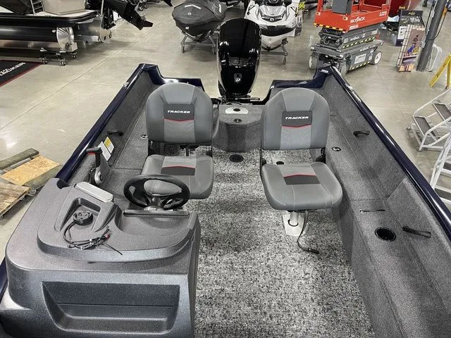 Slide: The Image of Interior view of Tracker Pro Guide V-16 SC boat, model year 2026. - 23