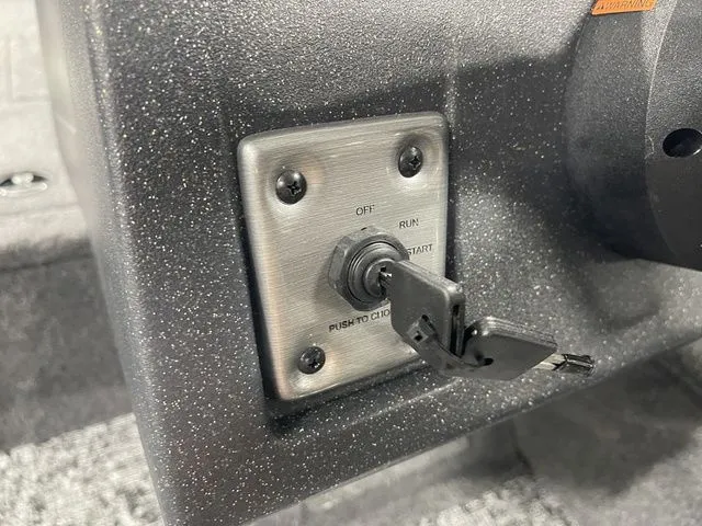 Slide: The Image of Ignition switch of 2026 Tracker Pro Guide V-16 SC boat. - 26