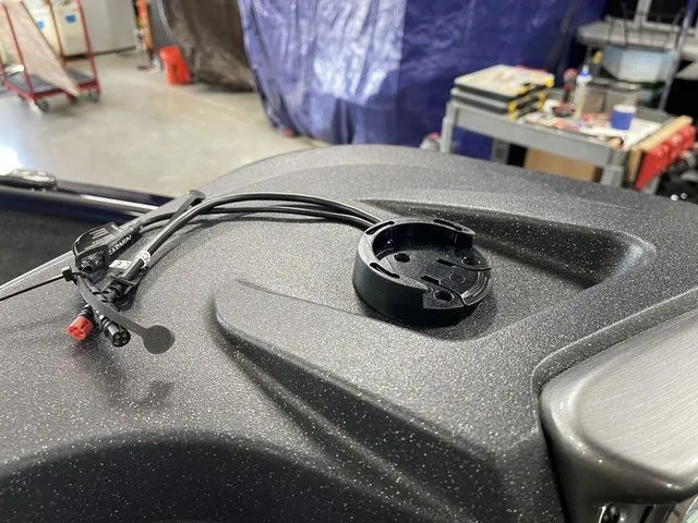 Slide: The Image of Close-up of Tracker Pro Guide V-16 SC 2026 dashboard. - 29