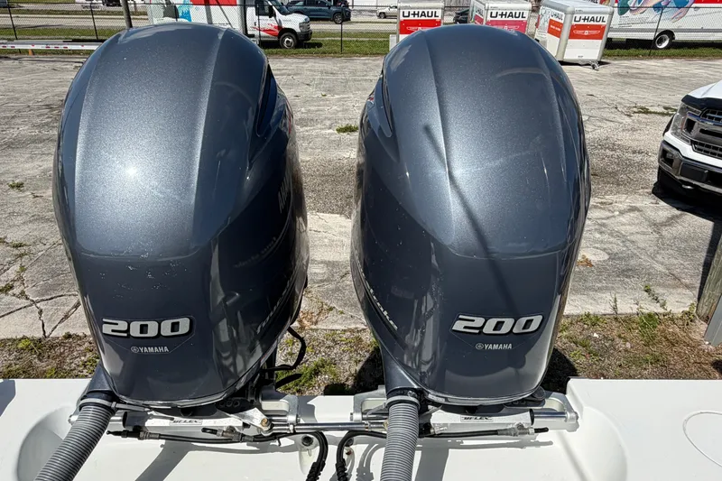 Slide: The Image of Twin Yamaha 200 outboard engines on a 2023 Contender 28 Tournament boat. - 18