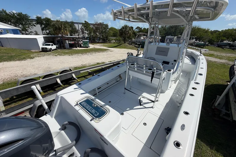 Slide: The Image of 2023 Contender 28 Tournament boat with spacious deck and modern console. - 22
