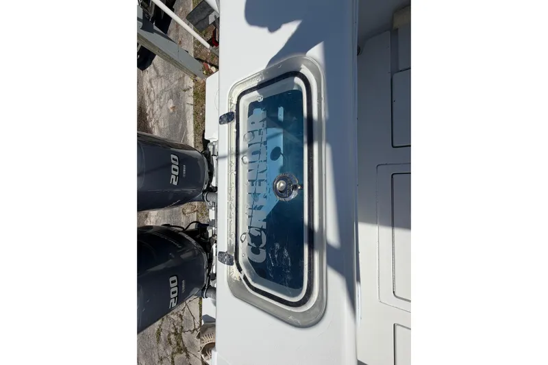 Slide: The Image of 2023 Contender 28 Tournament boat with dual 200 horsepower engines. - 36