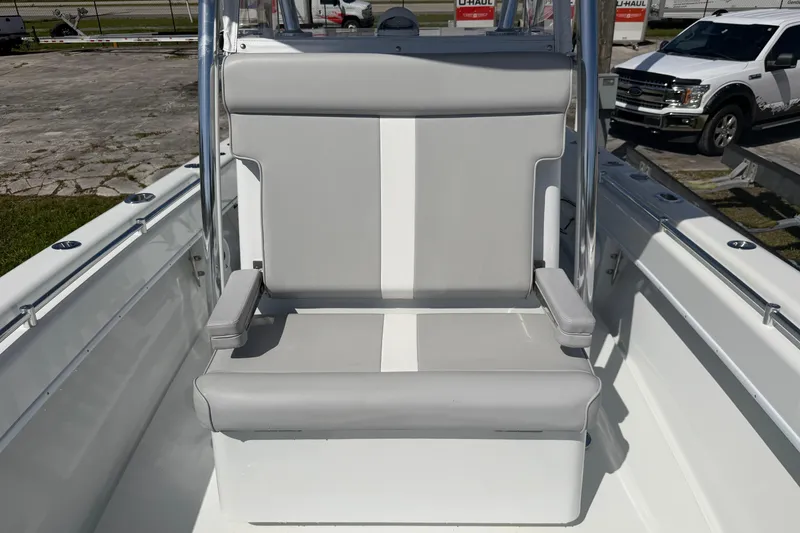 Slide: The Image of 2023 Contender 28 Tournament boat seat with gray and white upholstery. - 8