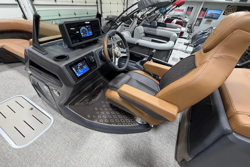 Slide: The Image of Luxurious interior of 2025 Bennington M Quad Bench 24 MFB pontoon boat with advanced dashboard. - 4