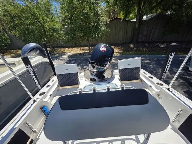 Slide: The Image of 2024 Tidewater 1910 Bay Max boat with outboard motor. - 10