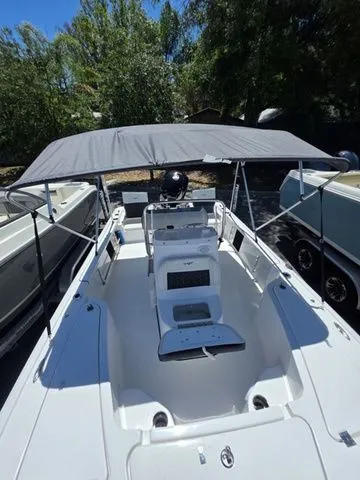 Slide: The Image of 2024 Tidewater 1910 Bay Max boat with canopy outdoors. - 20