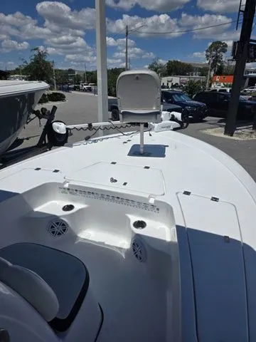 Slide: The Image of 2024 Tidewater 1910 Bay Max boat with seating and controls. - 25