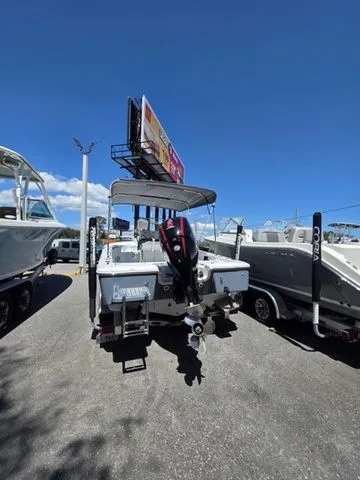 Slide: The Image of 2024 Tidewater 1910 Bay Max boat in a parking lot. - 31