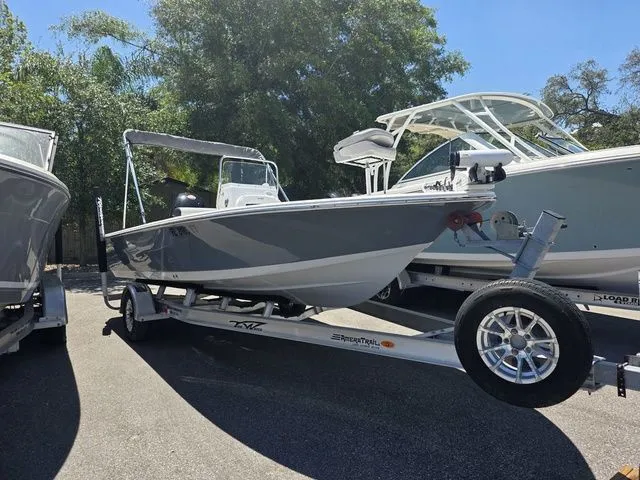 Slide: The Image of 2024 Tidewater 1910 Bay Max boat on trailer outdoors. - 32
