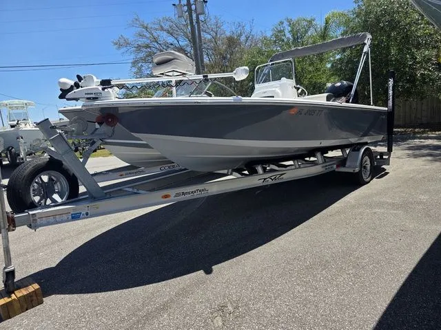 Slide: The Image of 2024 Tidewater 1910 Bay Max boat on trailer outdoors. - 33