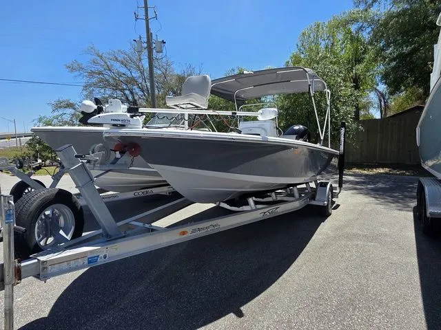 Slide: The Image of 2024 Tidewater 1910 Bay Max boat on trailer outdoors. - 4