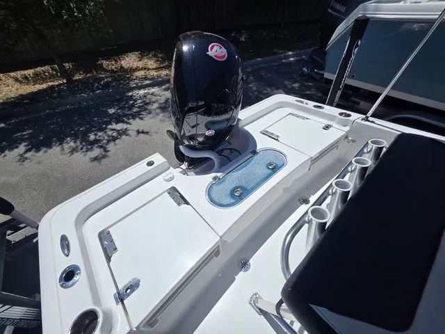 Slide: The Image of 2024 Tidewater 1910 Bay Max boat with outboard motor. - 8