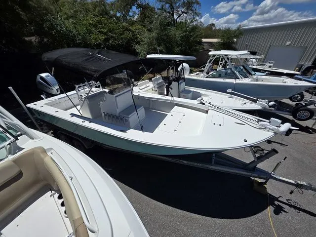 The Image of 2023 C-Hawk 25 Center Console boat on a trailer. - 1