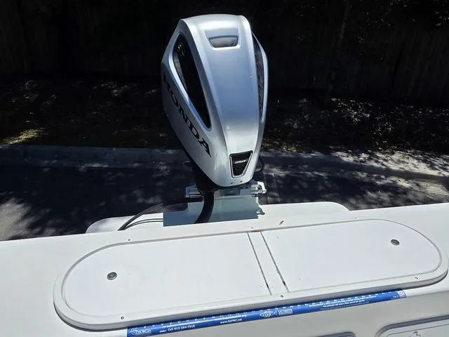 Slide: The Image of Honda outboard motor on C-Hawk 25 Center Console boat, 2023 model. - 11