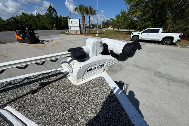 Slide: The Image of Minn Kota Terrova trolling motor on a 2021 Blazer Bay 2400 boat, parked outdoors. - 22