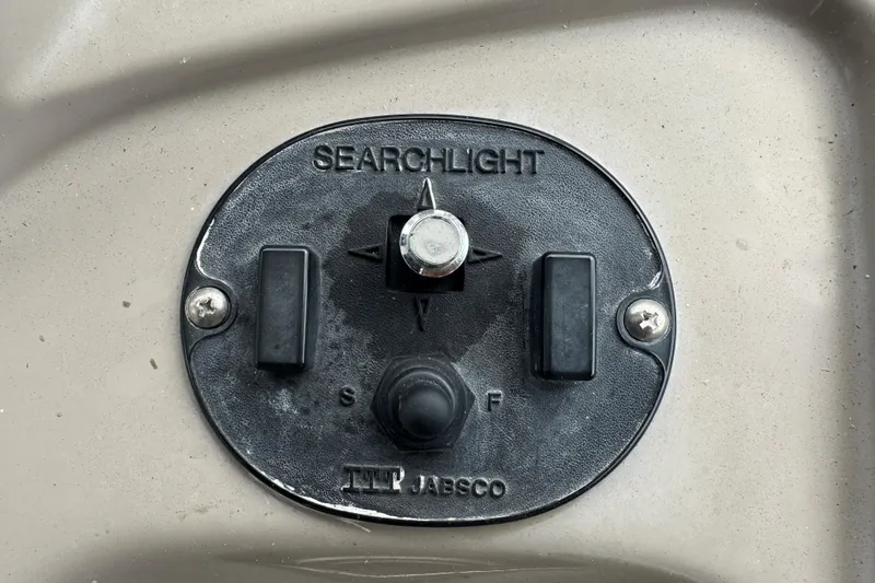 Slide: The Image of Searchlight control panel on 2009 Chaparral Signature 250 boat. - 20